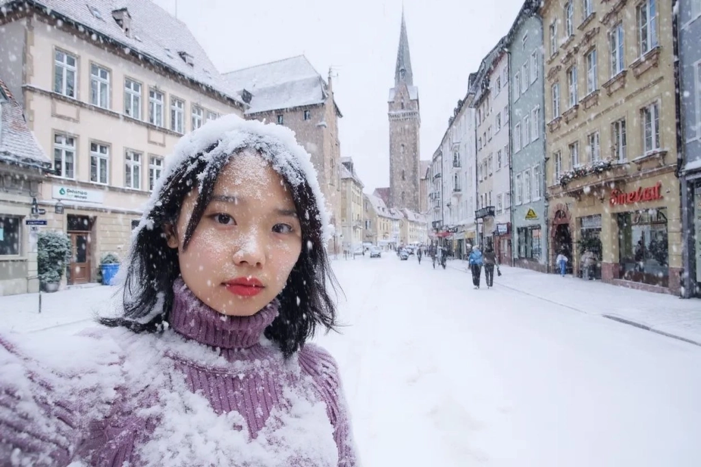 눈 내리는 장면의 같은 여성